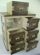Drawer details of cabinet showing hand cut dovetails.