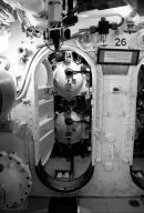 The sign says" there are no margins for mistakes, in a Submarine you are either alive or dead!"
