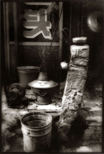 Cooking outdoors along the street in a Beijing Hutong