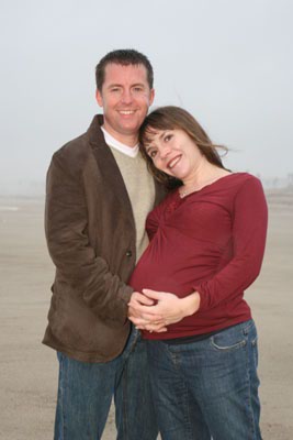 December 2006 was the time for a nice photo session at the beach.  The So Cal weather chipped right in...with rain and cold...oh well, they look good. 