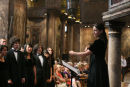 Christine Tavares directs inside St. Mark's Church in Venice, Italy.