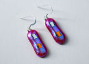 magenta patterned earrings