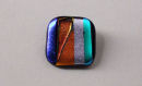 orange and green striped brooch