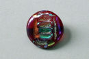 round red and gold brooch