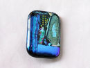blue patterned brooch