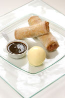 Rhubarb Spring Rolls with liquorice dipping sauce.