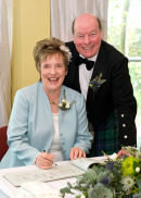 Signing the register.