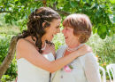 Cara and her Mum enjoying a joke in the garden