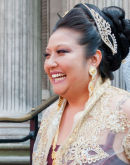 Bride laughing with guests