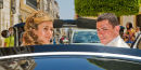 Bride & Groom leaving church in open topped car 