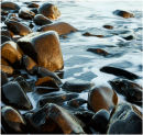Rocks and swirling sea