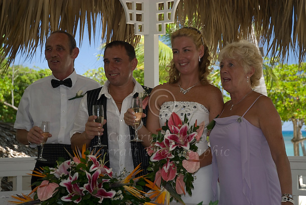 Happy couple with parents