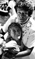 Walkway collapses into Sydney Harbour, celebrity comforts a frightened child.