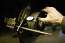 Checking lateral run out on a brake disc.