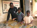 Oumar with two of the children