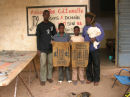 Oumar and Bassidy with two young students
