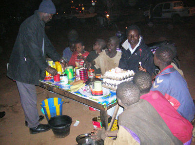 Kader feeds children at night