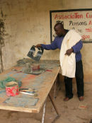 Bassidy removes a stencil