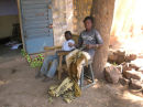 Dra and Papou stitching bogolan cloth