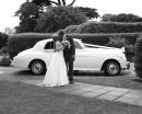 Kiss by the car -  Stephanie & James