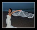 Asli having fun with her veil on Bournemouth Beach