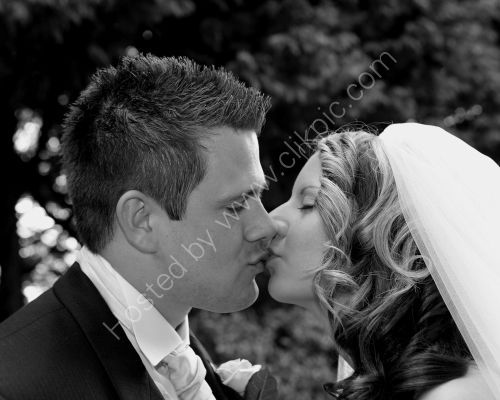 Lara & Jamie - The Kiss - Wedding @ the Moorhill House Burley