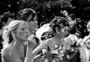 Bridesmaids blowing Bubbles